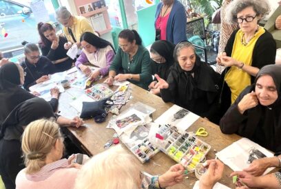 At the embroidery event, women from Grandma Came to Work and the Citizens Xelerator Action Laboratory shared experiences and learned new skills. Launched in 2023, the Citizens Xelerator project promotes civic literacy and social empathy among adults. Photo: Citizens Xelerator.